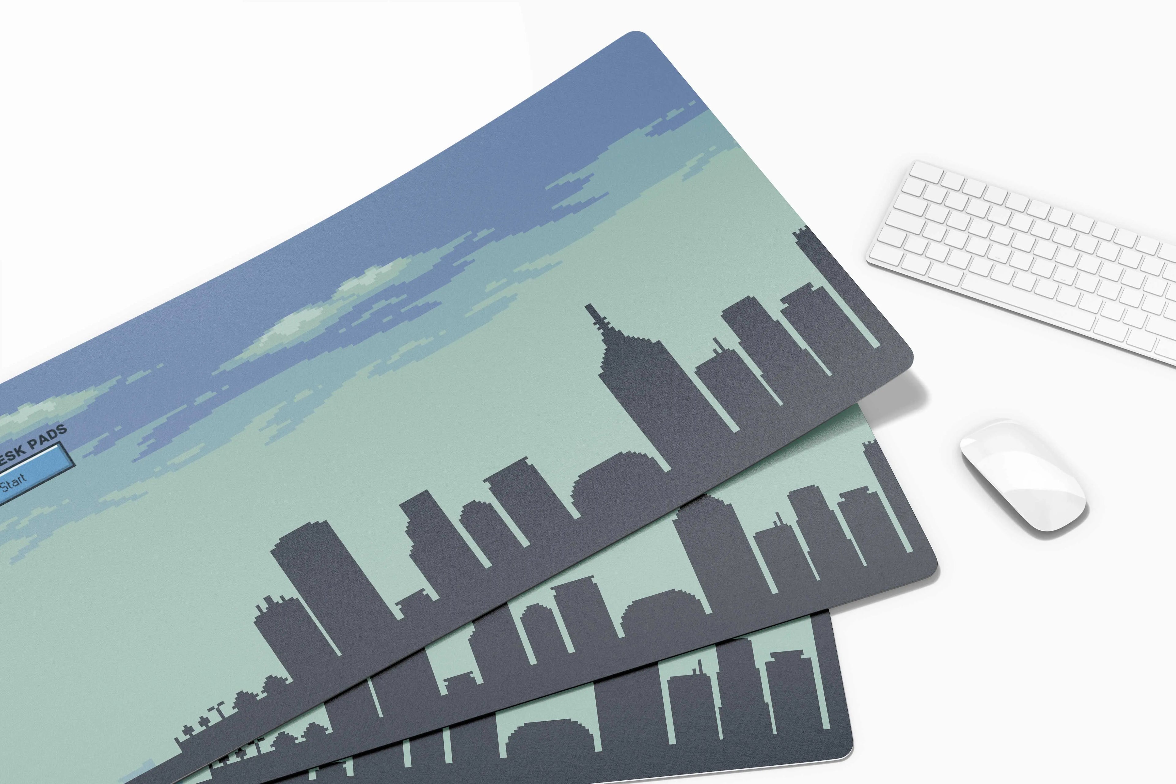 3 CityNights DeskPads with a mouse and keyboard